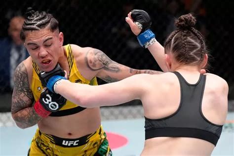 UFC star blames her breast falling out of sports bra for shock loss